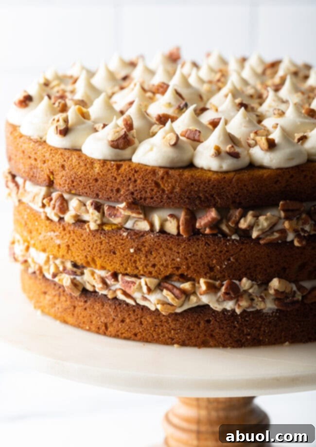 pumpkin-spice-cake-with-maple-frosting.jpg Pumpkin Spice Cake close up shot with Maple Frosting