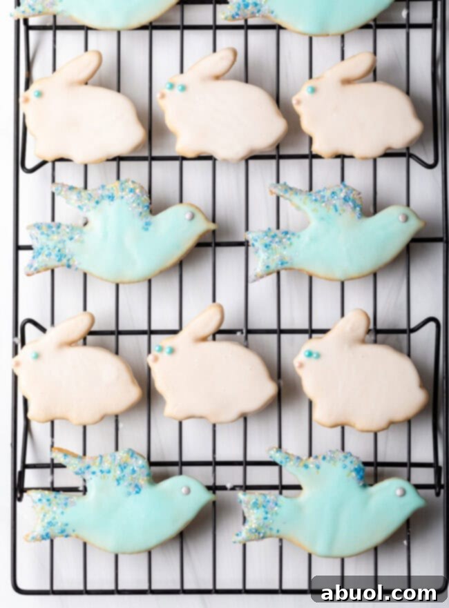 Adorable bunny and bird shaped decorated sugar cookies with smooth, simple sugar cookie icing and sprinkles.