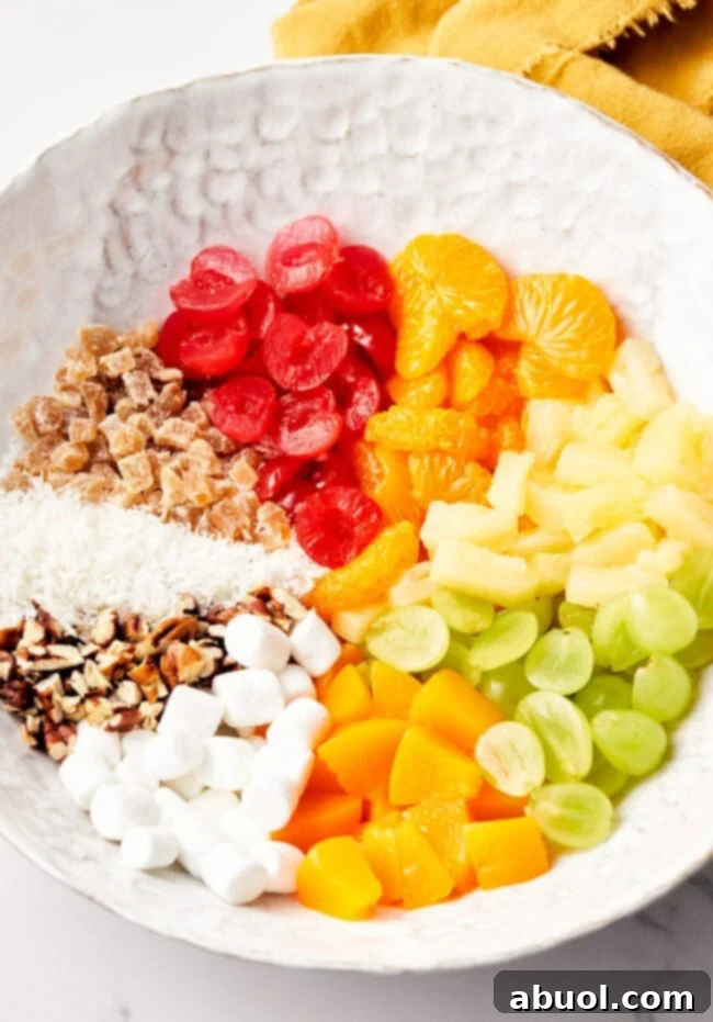 Closeup view of bowl with measured and chopped ingredients for Ambrosia Salad Recipe 
