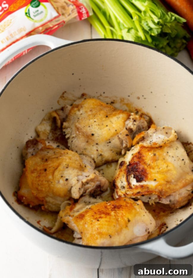 A step-by-step image showing how to prepare the chicken noodle soup ingredients.