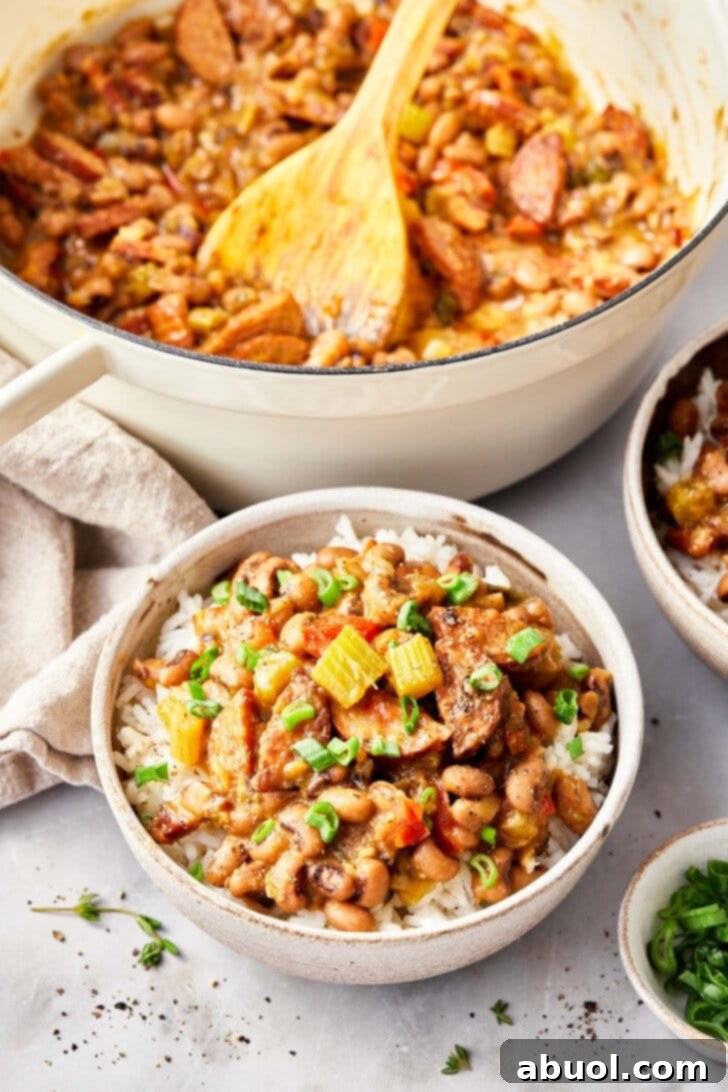 Overhead view of pot full of hoppin john with a closeup of ready to eat bowl of hoppin john served over white rice. 