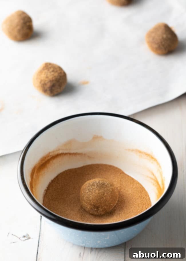 How To Make Chocolate Snickerdoodles - dough balls covered in sugar coating