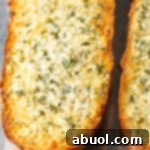 Easy Homemade Garlic Bread Recipe #ASpicyPerspective #bread #garlic #cheese #best #garlicbread