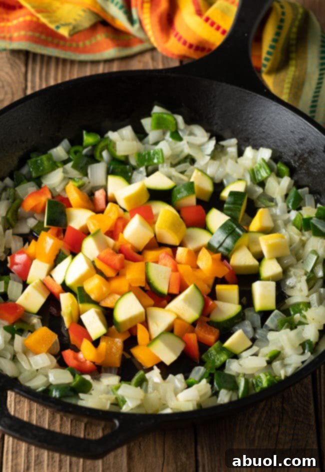 How To Make Calabacitas Con Queso Recipe #ASpicyPerspective #squash #vegetarian #mexican #sidedish #glutenfree