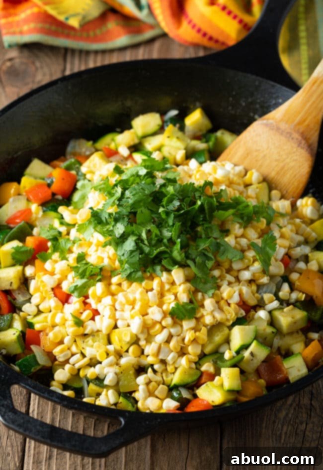 Calabacitas Con Elote Recipe #ASpicyPerspective #squash #vegetarian #mexican #sidedish #glutenfree