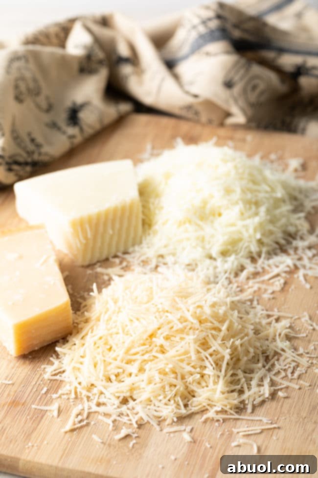 Freshly grated Parmesan cheese ready for Cacio e Pepe