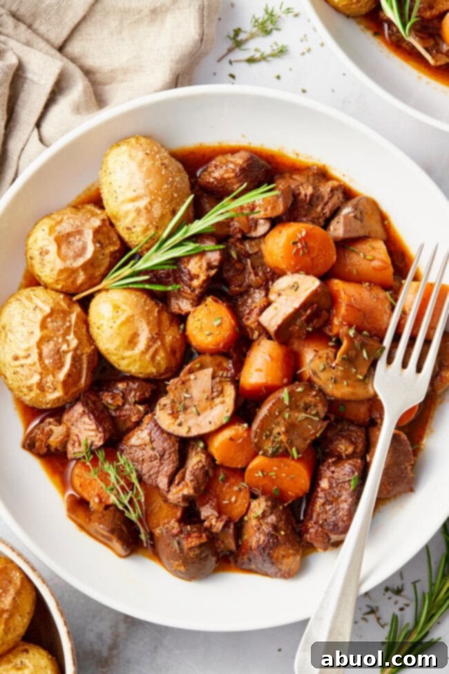 Venison Bourguignon (Deer Stew Recipe) in a white bowl. 