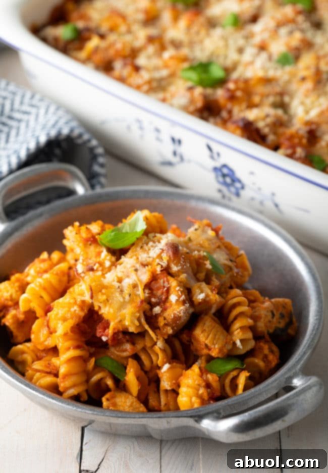 Effortless No-Boil Chicken Parmesan Pasta 12 Baked chicken pasta served in a bowl.