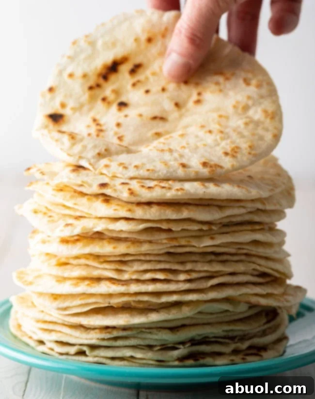 Homemade Flour Tortilla Recipe stacked on plate