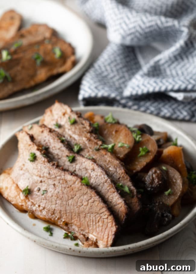 Step-by-step guide on how to make the best slow cooker beef brisket with potatoes and onions