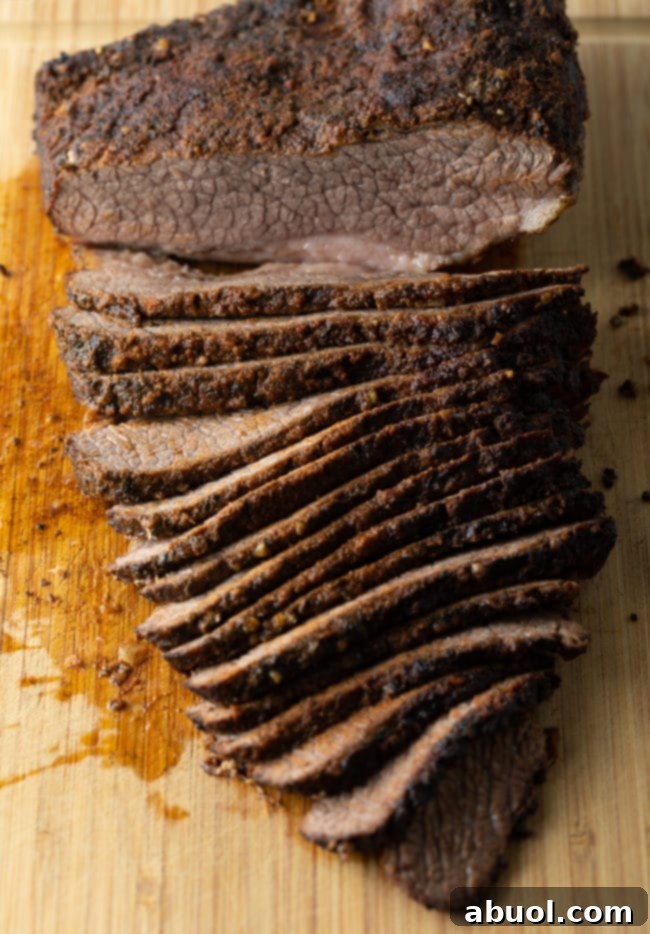Tender beef brisket made in the slow cooker, ready to be carved