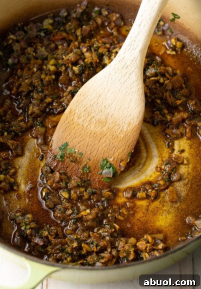 Fiery South Indian Chicken Curry 7 Cooking aromatics for Madras Chicken Curry