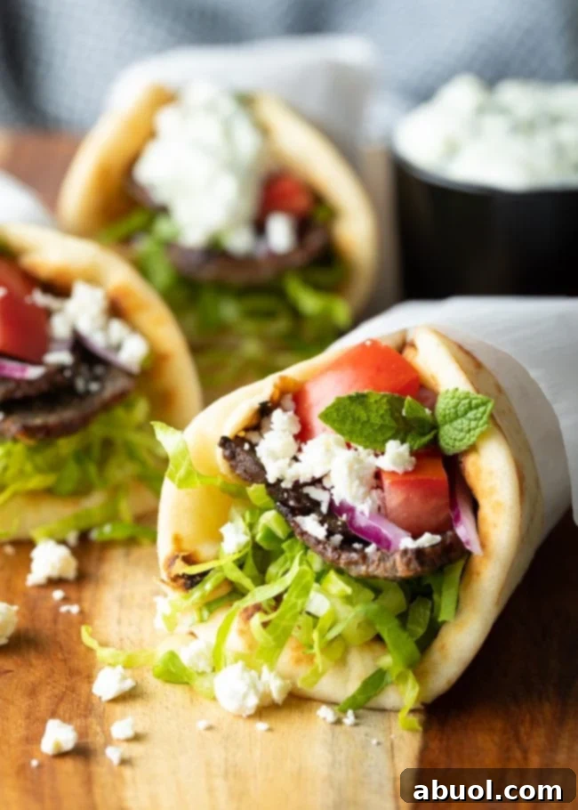 Homemade lamb gyro recipe wrapped in paper parchment.