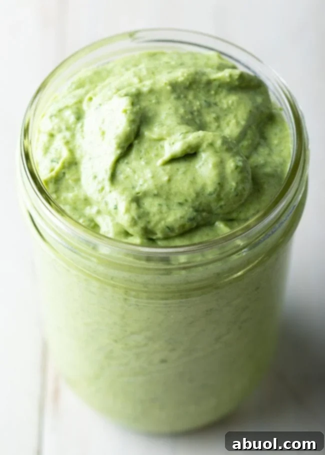 Homemade pesto with cream in a jar.