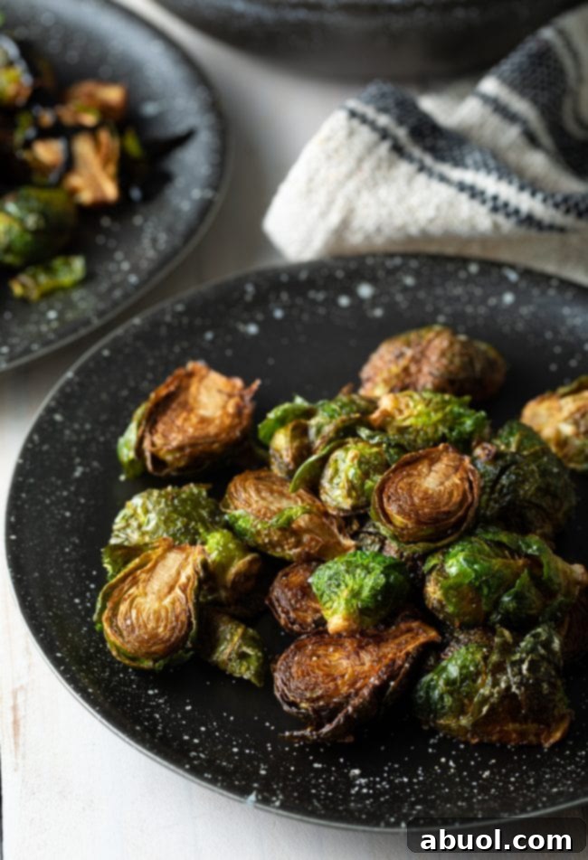 A serving of crispy Brussels sprouts, perfectly plated and ready to be enjoyed.