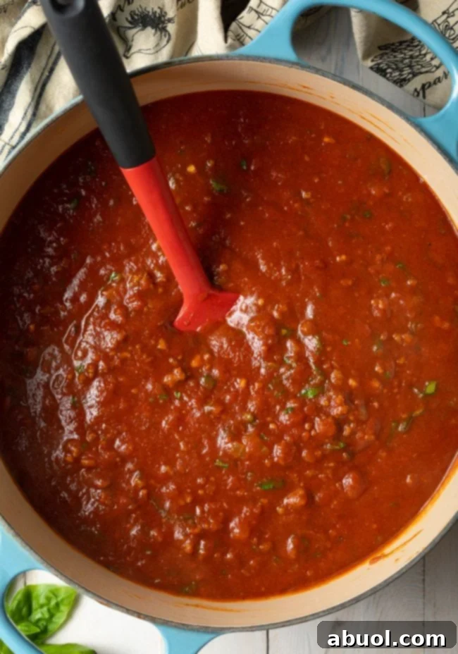 A large pot filled with delicious homemade meat sauce for spaghetti