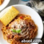 Budget friendly plate of spaghetti with meat sauce.