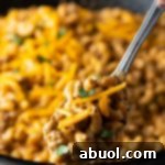 A small, mouth-watering portion of homemade hamburger helper.