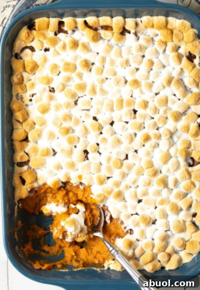 baked sweet potato casserole with pecans and marshmallows