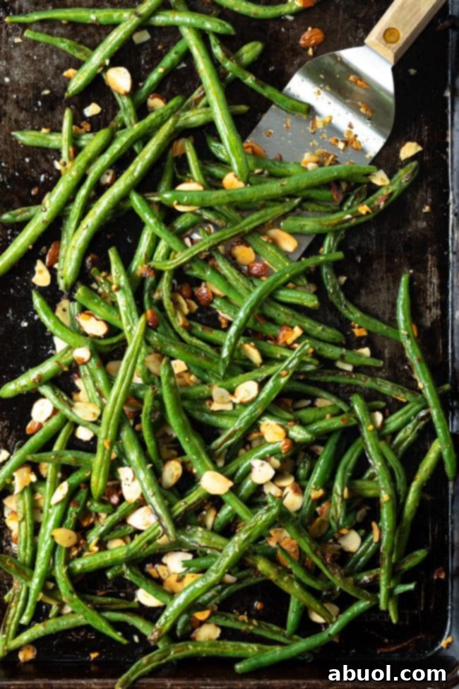 Close-up of how to roast beans with almonds in the oven, showing the golden texture