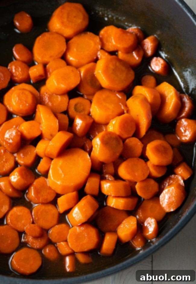 A close-up of the best carrot side dish recipe, showcasing its beautiful glaze and tender texture.