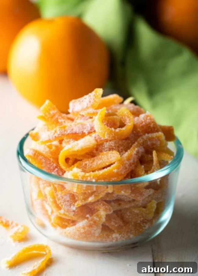 candied orange peels for the holidays in small glass bowl