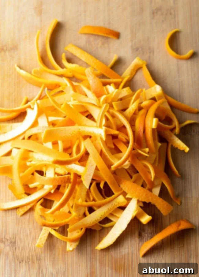 strips of orange rind cut for caramelised orange peel