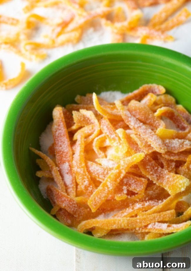 bowl of sugar with orange rinds