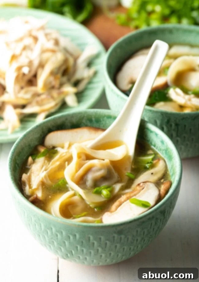 House Special Wonton Soup 2 wor wonton soup in green bowl with vegetables