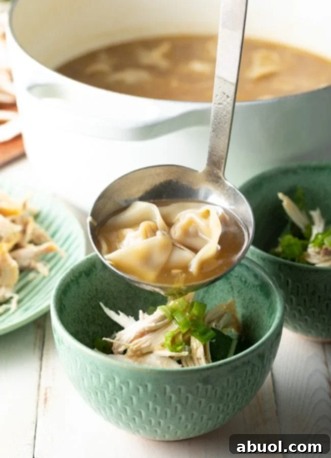 House Special Wonton Soup 14 pouring soup over vegetables in bowls