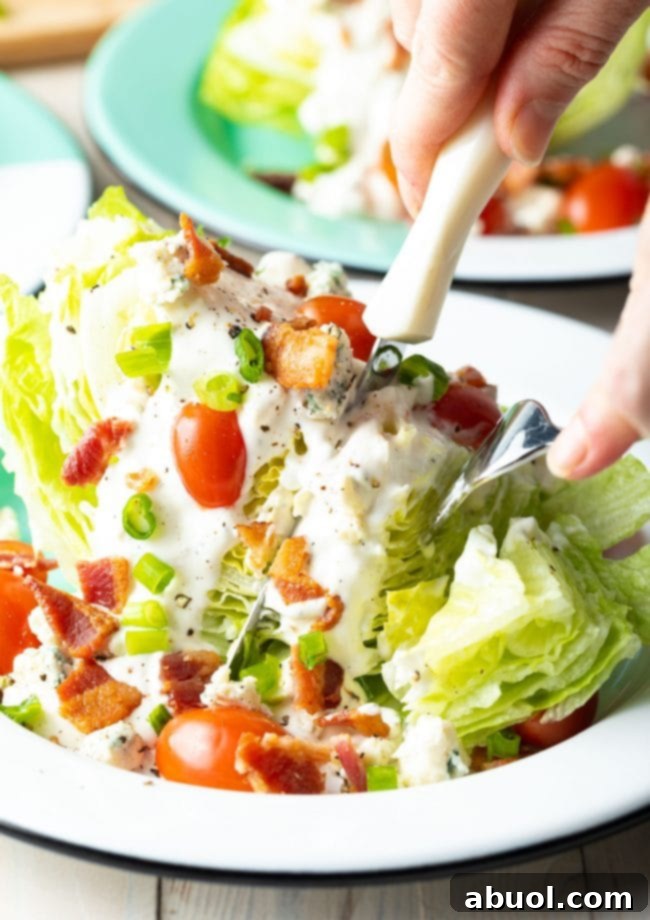 iceberg wedge salad - Blue Cheese Wedge Salad with lots of toppings, cut into pieces