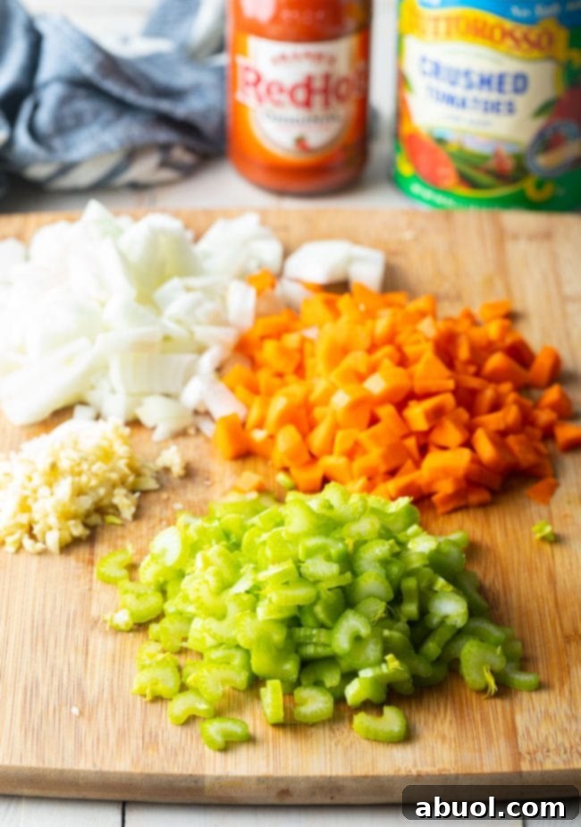 Freshly chopped onions, carrots, and celery, key ingredients for Buffalo Chicken Chili.