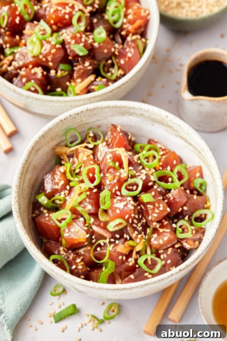A beautifully arranged bowl of Ahi Poke, highlighting its fresh ingredients and vibrant colors, ready to be enjoyed.