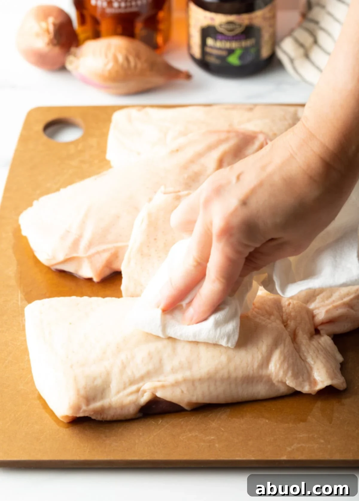 Step 1: Drying duck breasts thoroughly for crispy skin