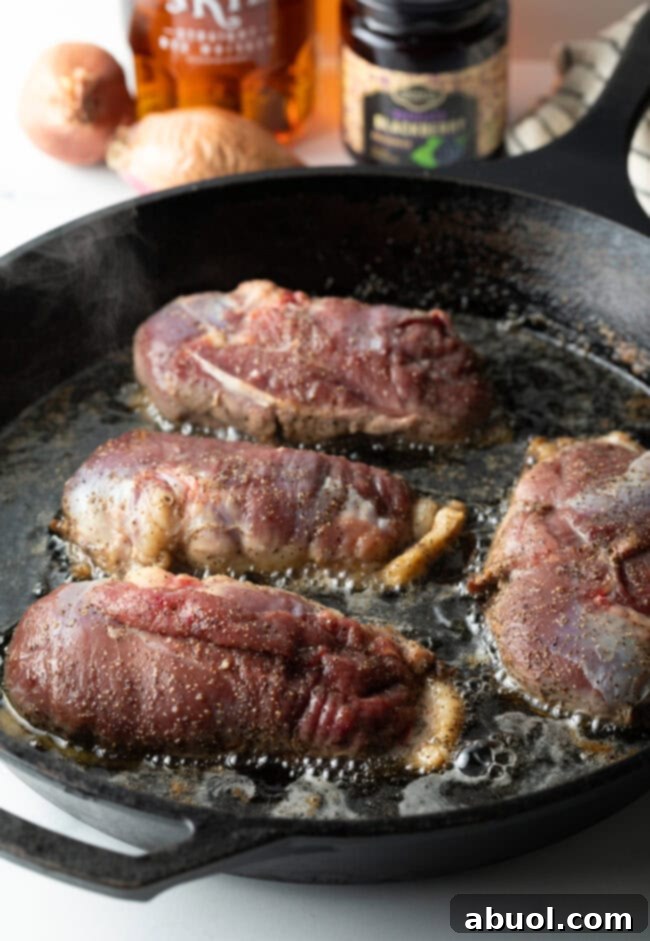 Pan searing duck breast in a hot skillet