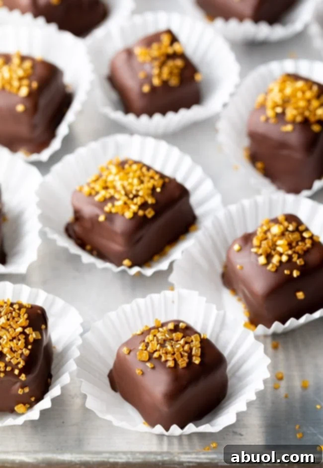 Decadent Chocolate Petit Fours 11 Mini chocolate cakes with gold sprinkles on top. Petit Fours Recipe