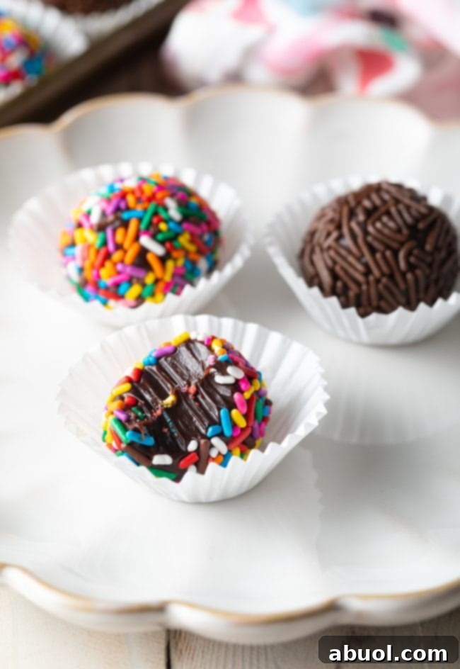 Close up shot of Brazilian truffles plated with one half eaten. 