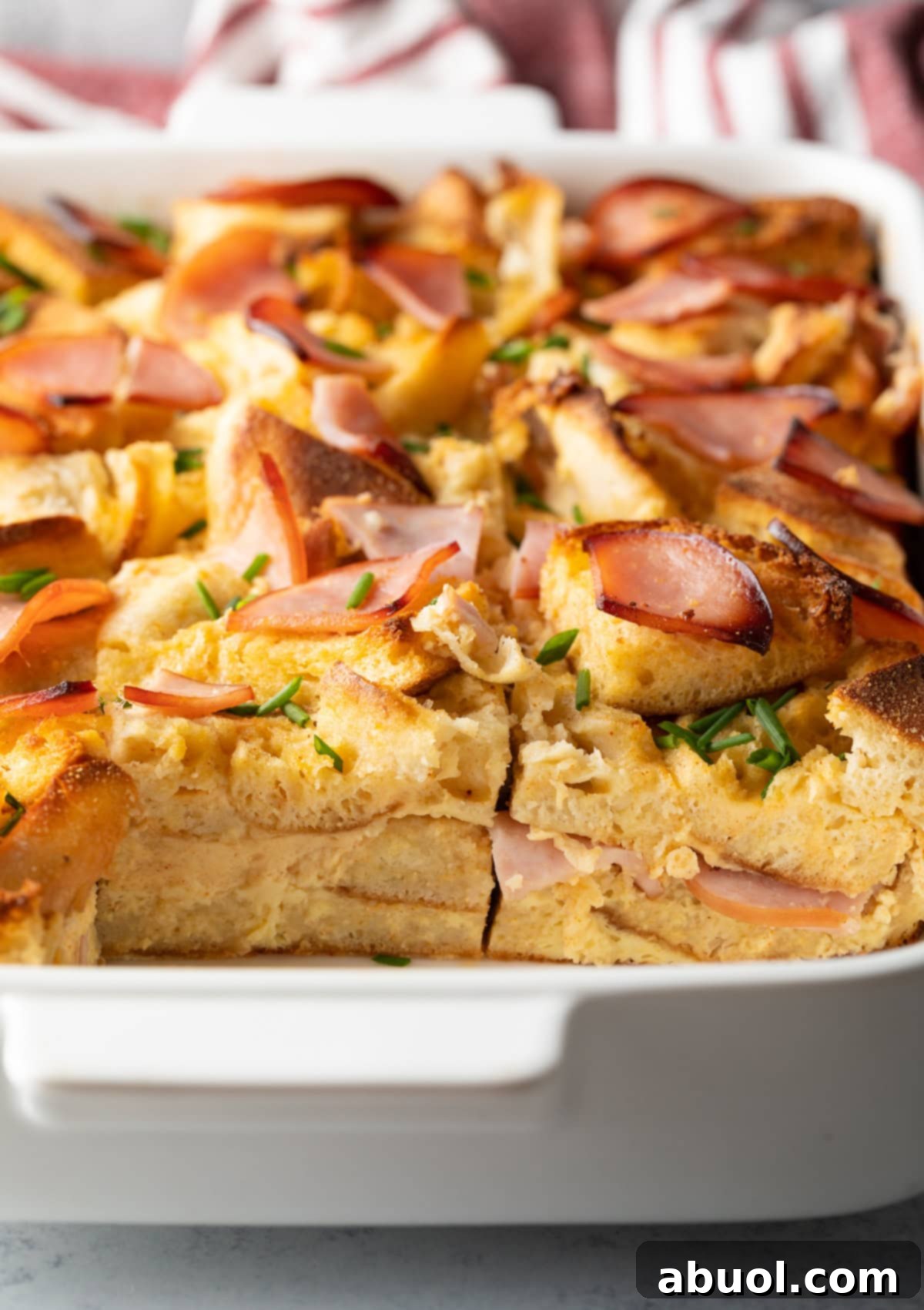 Eggs Benedict Casserole with interior layers visible