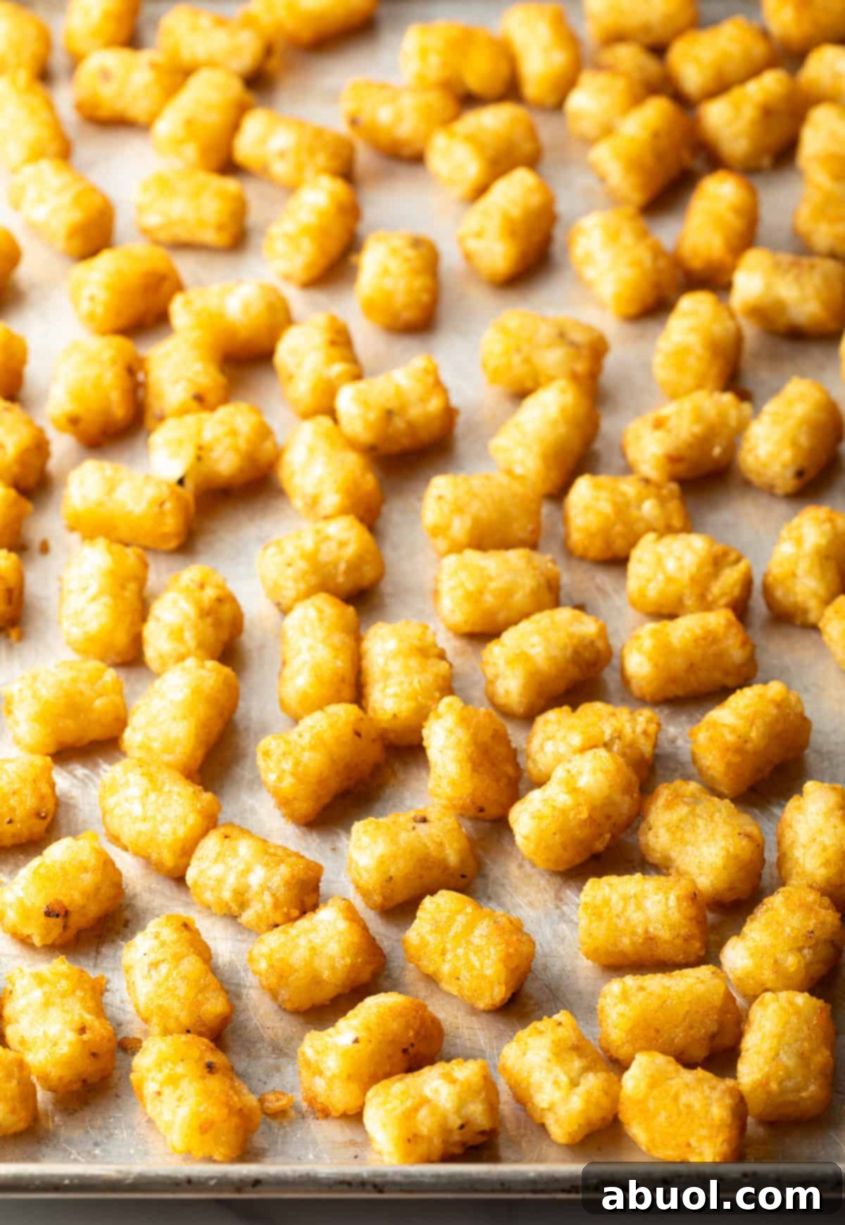 Baking sheet of crispy baked tater tots