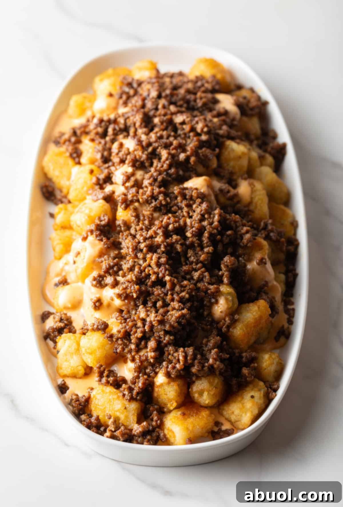 Tater tots covered with ground beef