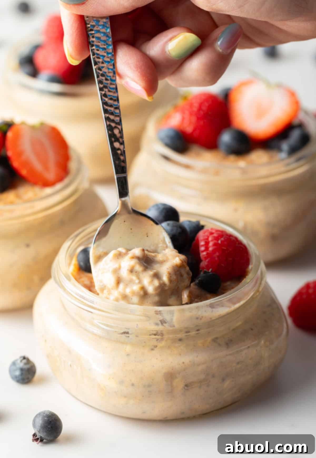 Spoonful of high-protein oatmeal from a jar