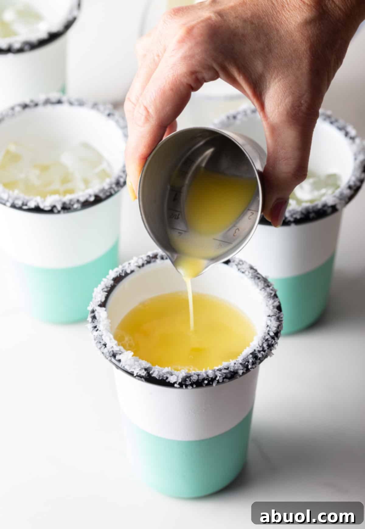 Pouring Juice into a Margarita Glass