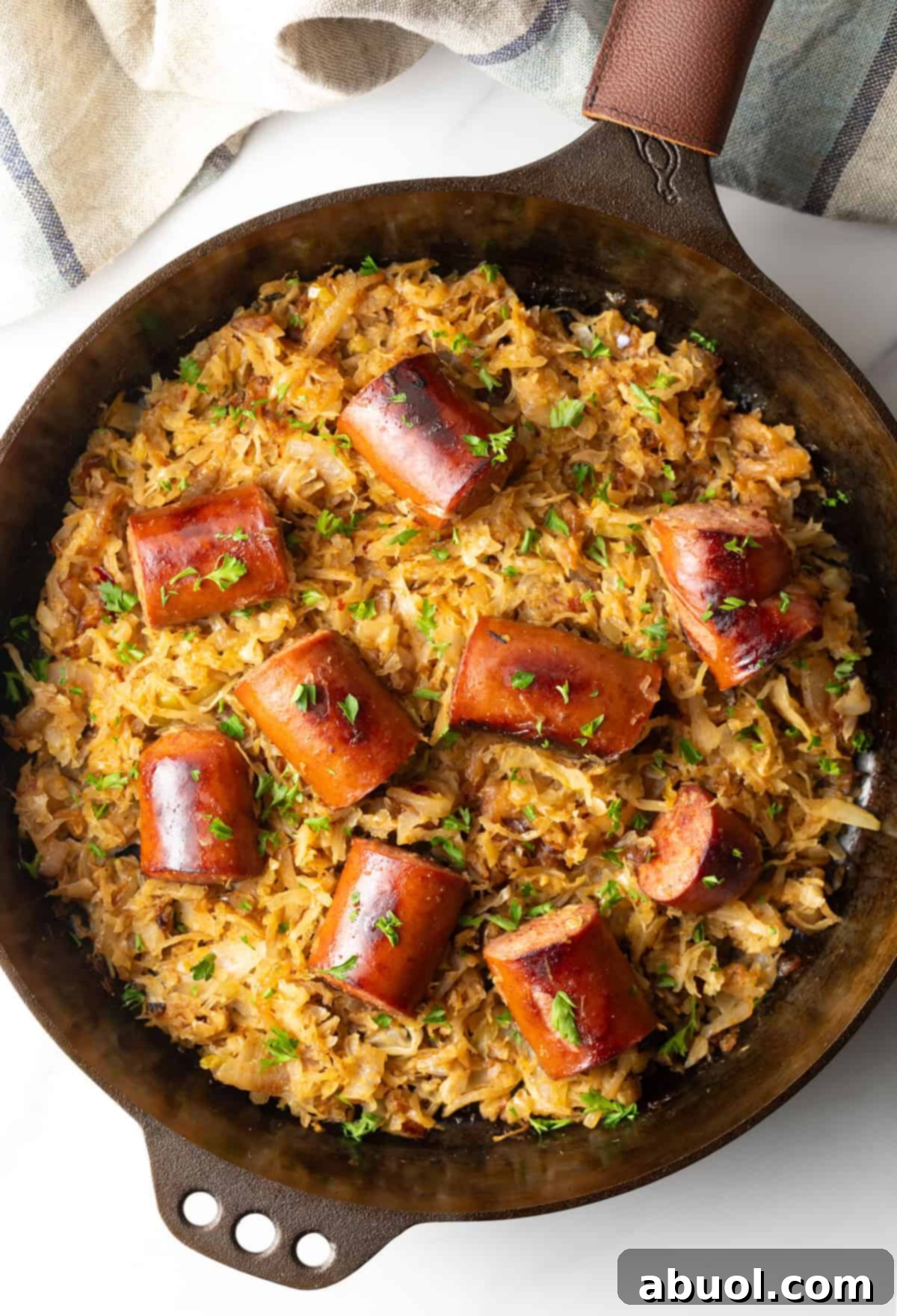Skillet with browned sauerkraut and kielbasa