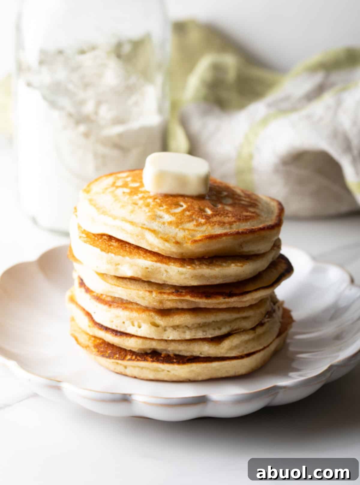 Stack of pancakes with butter