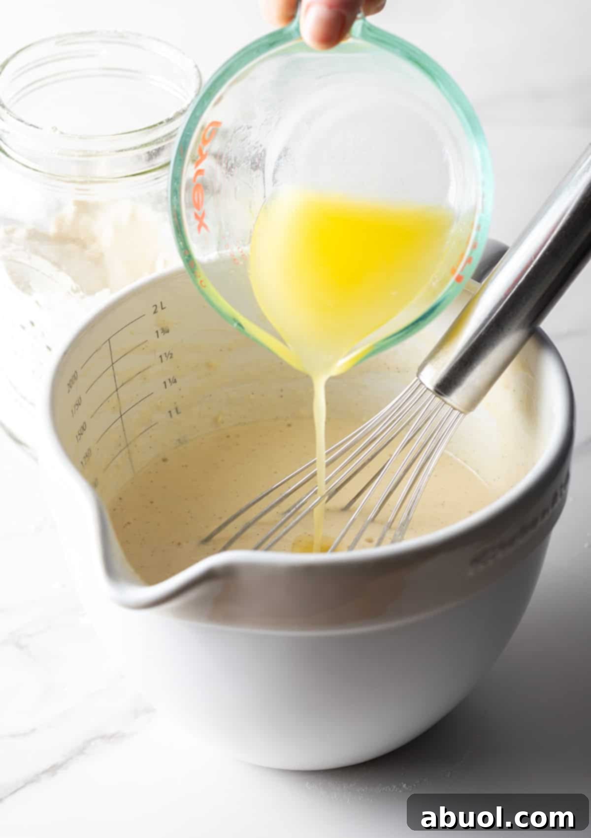 Adding melted butter to pancake mix