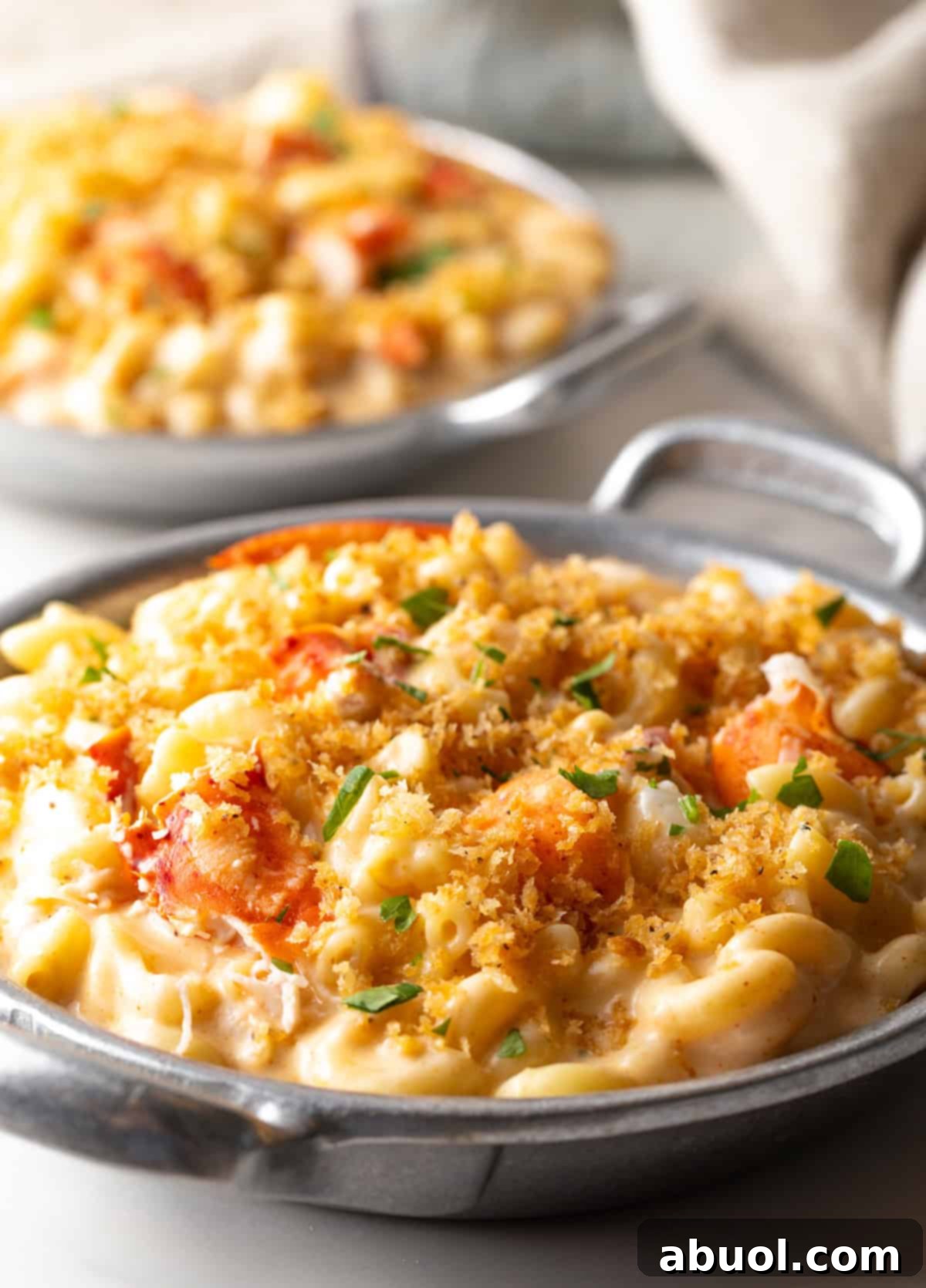 Lobster mac and cheese with breadcrumbs and parsley