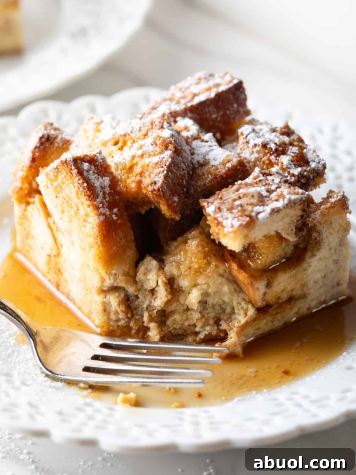 French Toast Casserole on a Plate with Syrup
