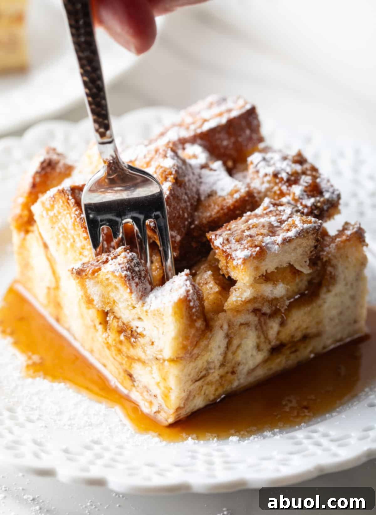 Fork Taking a Bite of French Toast Casserole