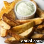 Air Fryer Potato Bites 14 Air Fryer Potato Wedges on a Plate