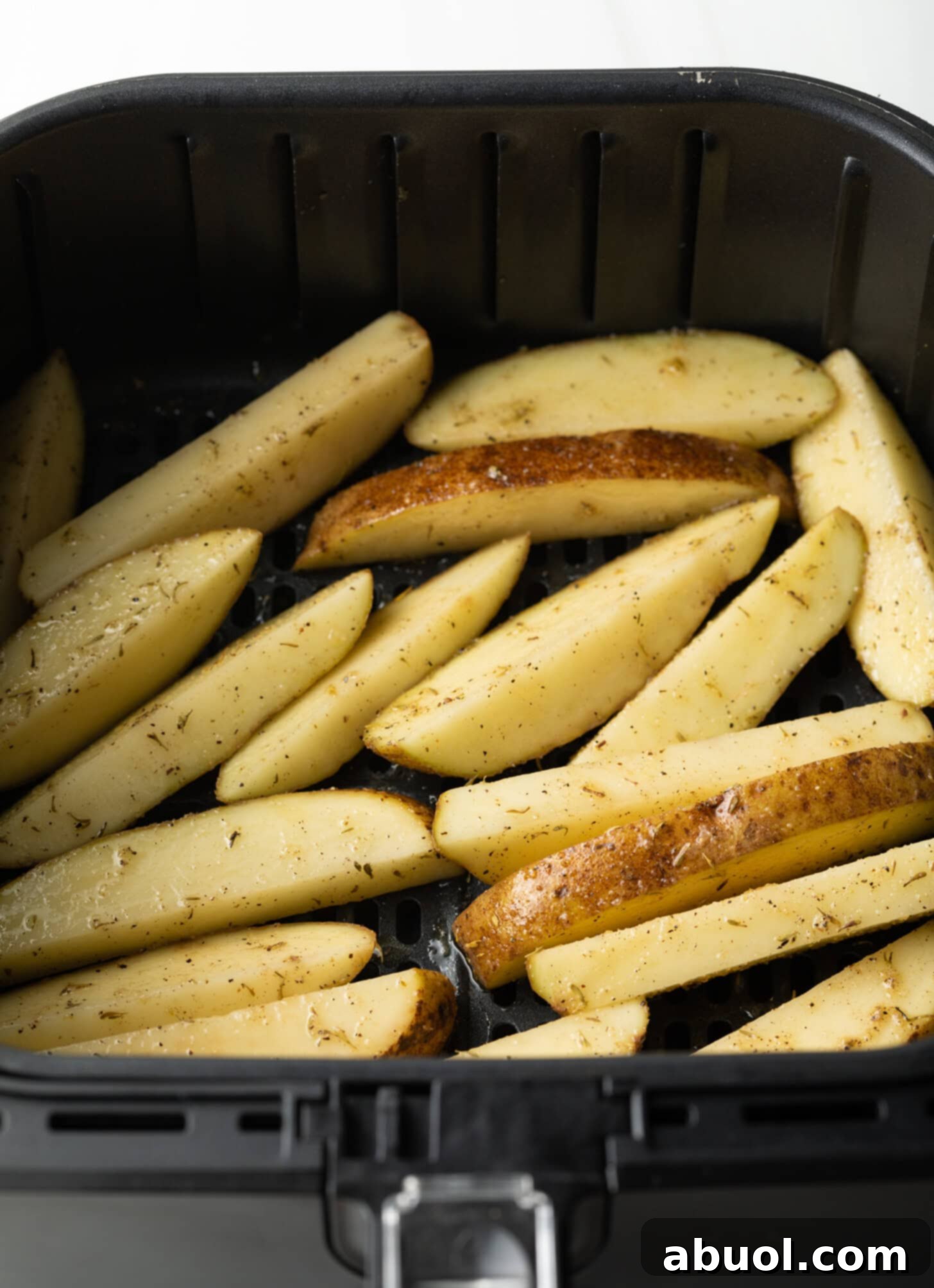 Air Fryer Potato Bites 9 Potato Wedges in Air Fryer Basket
